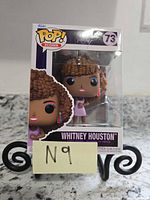 Front view of boxed Funko Pop Whitney Houston #73