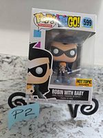 Front view of boxed Funko Pop showing character and Hot Topic sticker