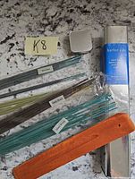 Full kit with incense sticks, wooden holder, metal tin