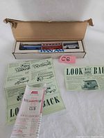 Box with three Pan Am vehicles and accompanying leaflets