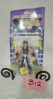 Front view of sealed Stephanie McMahon MOTWU action figure on blister card
