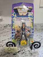 Front of sealed Stephanie McMahon MOTWWEU figure on card