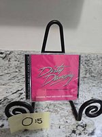 Front of sealed Dirty Dancing cast recording CD on stand