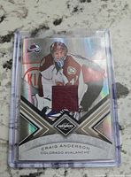 Front of Craig Anderson jersey card showing swatch and design