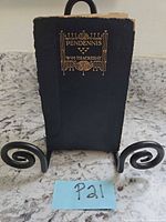 Front cover showing gilt title and decoration