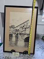 Front view with tape measure indicating frame height