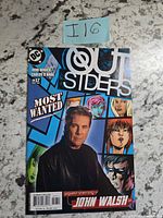 Front cover showing title, issue number, John Walsh guest appearance