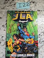 Front cover of JLA New World Order trade paperback