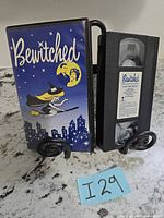Front view of Bewitched VHS cassette and illustrated slipcase