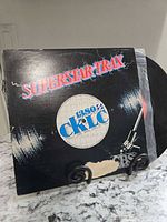 Front cover of CKLC Superstar Trax LP showing graphics and CBS logo