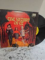 Front cover and vinyl disc showing artwork, label and condition