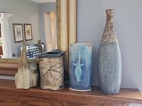 All four vases on mantle
