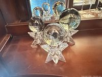 Group of clear glass spheres on star stands