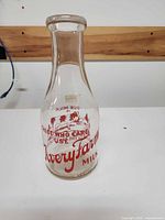 Full view of Avery Farms glass milk bottle