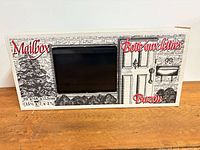 Front of unopened mailbox box showing product illustration and dimensions