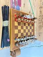 Chessboard, legs bundle, chess pieces on board