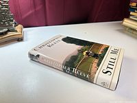 Angled view of hardcover with dust jacket "Still Me" by Christopher Reeve