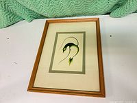 Front view of framed Clemence Wescoupe print showing image, matting, frame