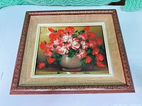 Front view of framed oil painting showing subject and frame detail