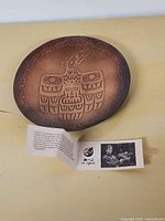 Front view of copper plate with pamphlet