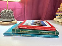 Stack of three Ontario history books on table