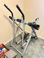 Overall view of Tony Little Gazelle Freestyle glider folded in corner