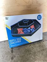 Front of unopened Triple Toss Challenge game box