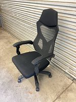 Front view of black mesh and fabric ergonomic office chair