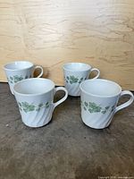 All four Corelle ivy pattern mugs front view