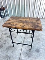 Full view of table top, frame and floor context