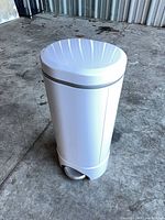 Full view of white diaper pail closed