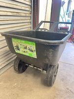 Front angled view of black plastic Smart Cart 450 tub attached to wheeled base