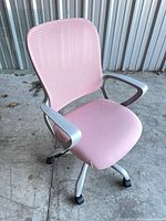 front three-quarter view of pink office chair