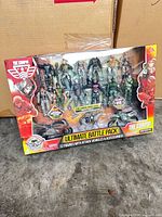 Front of sealed Ultimate Battle Pack showing 12 figures, vehicles and branding