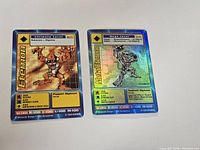 Both Digimon cards side by side