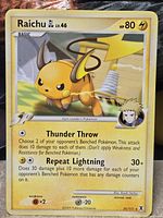 Front view showing Raichu GL LV.46 card details and condition