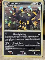Front of Umbreon cracked-ice holo card showing artwork, attacks and set symbol