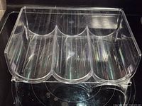 Top view showing three separate bottle compartments and ribbed interior