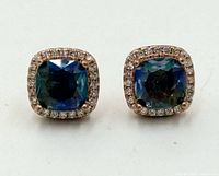 front view of both earrings showing mystic topaz centers and halo accents