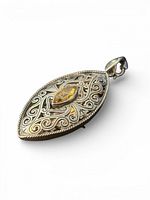 Front view showing filigree design and citrine