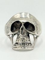 Front view of skull ring showing detailed facial features