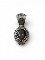 front view of silver pendant with smoky quartz and ornate bail