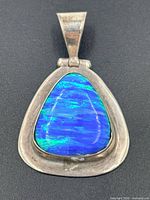 Front view showing opal and sterling frame