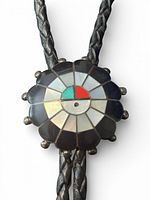 Close-up of Sunface inlay slide on braided cord