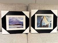 Both framed prints on couch showing overall appearance