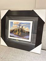 Full view of framed print with protective corner covers