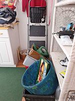 Overall view showing fabric basket, wicker basket, watering cans, storage tub stack