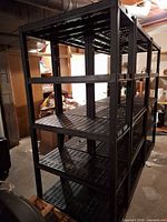 Full view of black plastic rack front/side