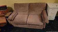 Front view of brown microfiber loveseat showing both seat and back cushions