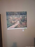 Full view of framed Manet reproduction poster on wall